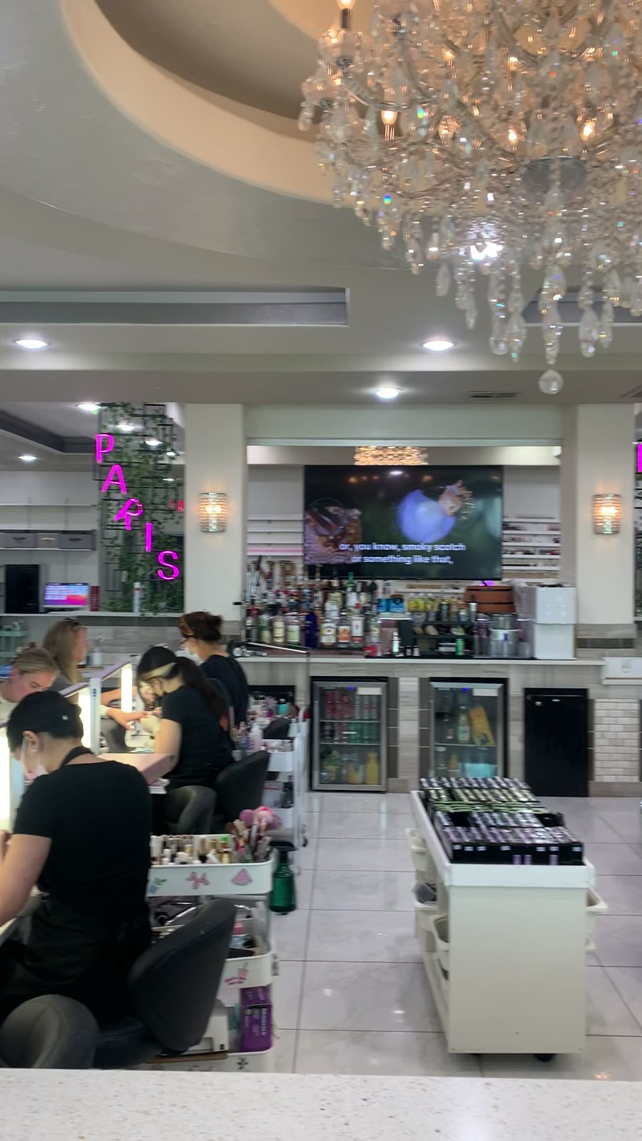 Manicure bar under chandeliers